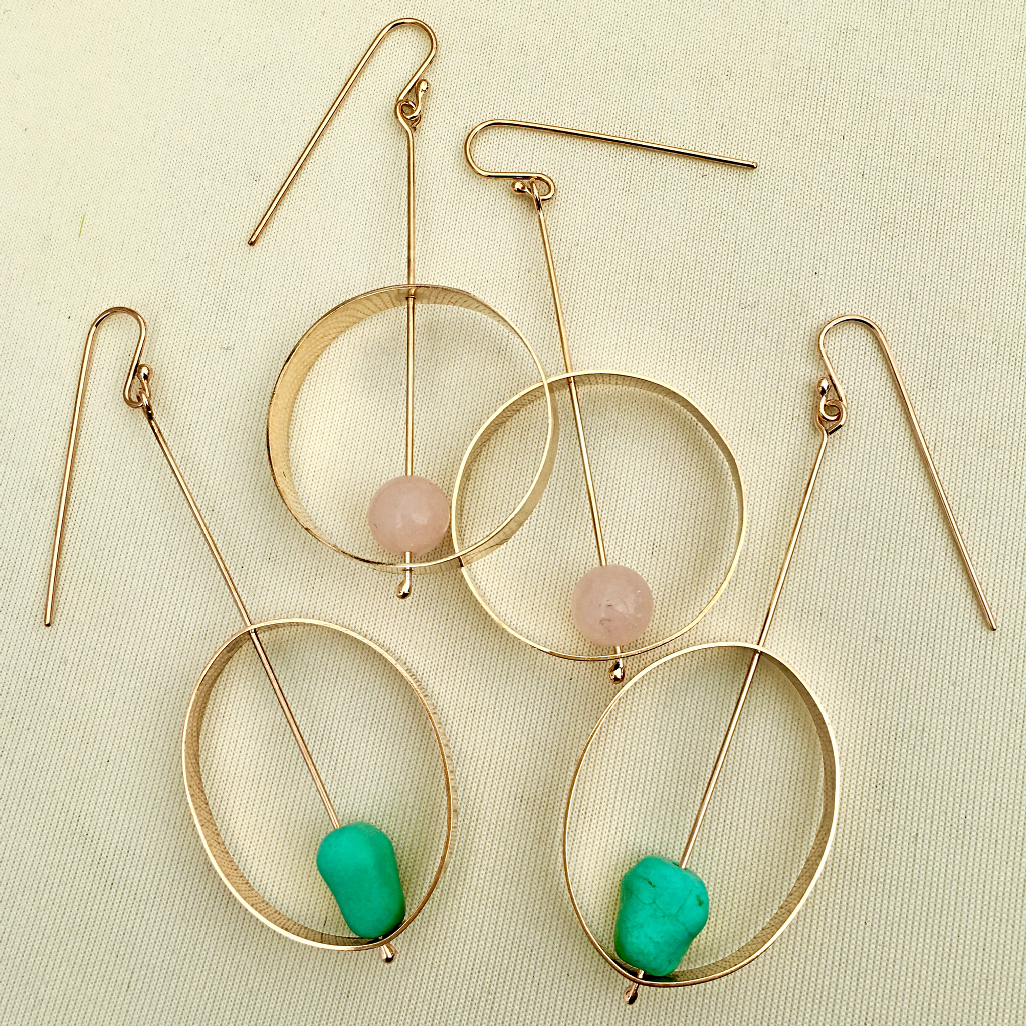 Dangle loop earring with genuine stones