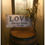 Thumbnail: “Love always trusts” sign and easel 