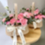 Basket of Joy bouquet featuring vibrant carnations in a radiant floral arrangement.