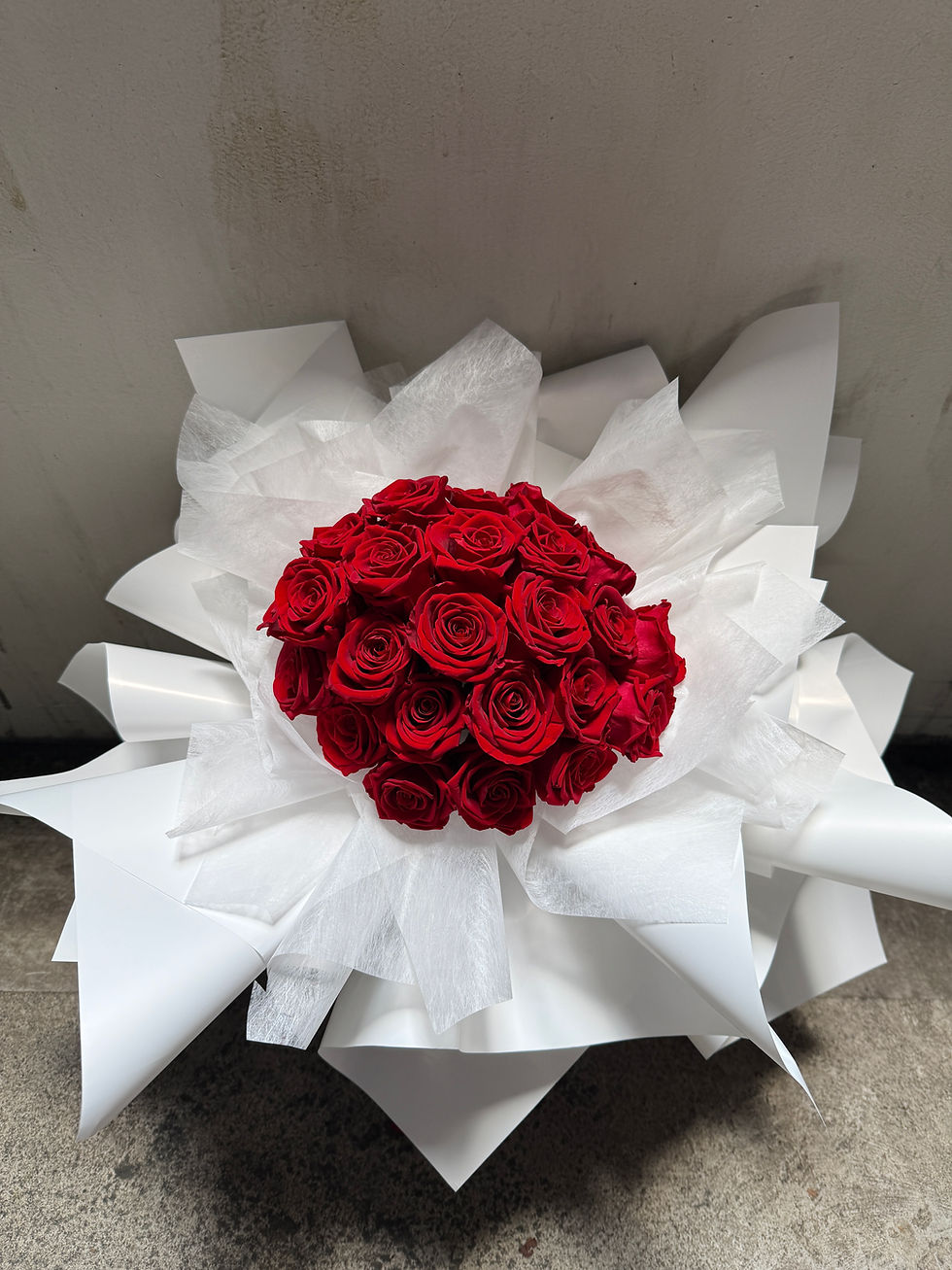 Luxury red preserved rose bouquet in white wrapping with The Dancing Flowers ribbon