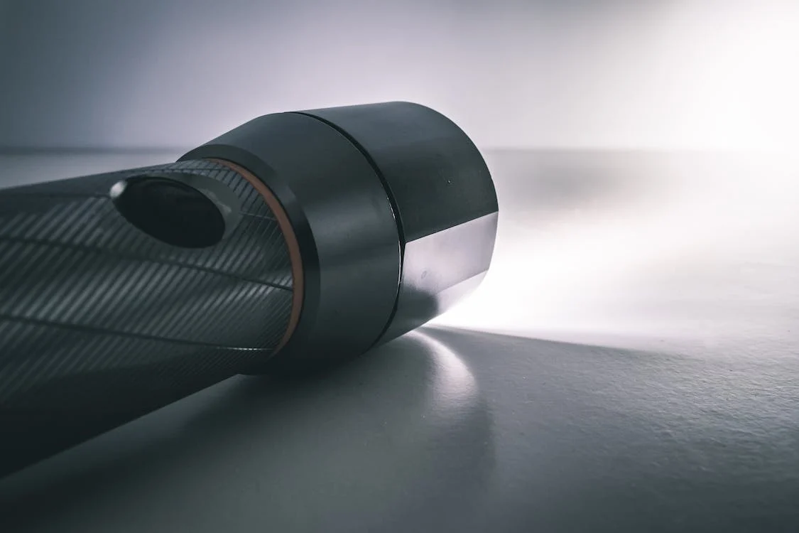 A small torch is easy to carry in and dog walking bag or bum bag