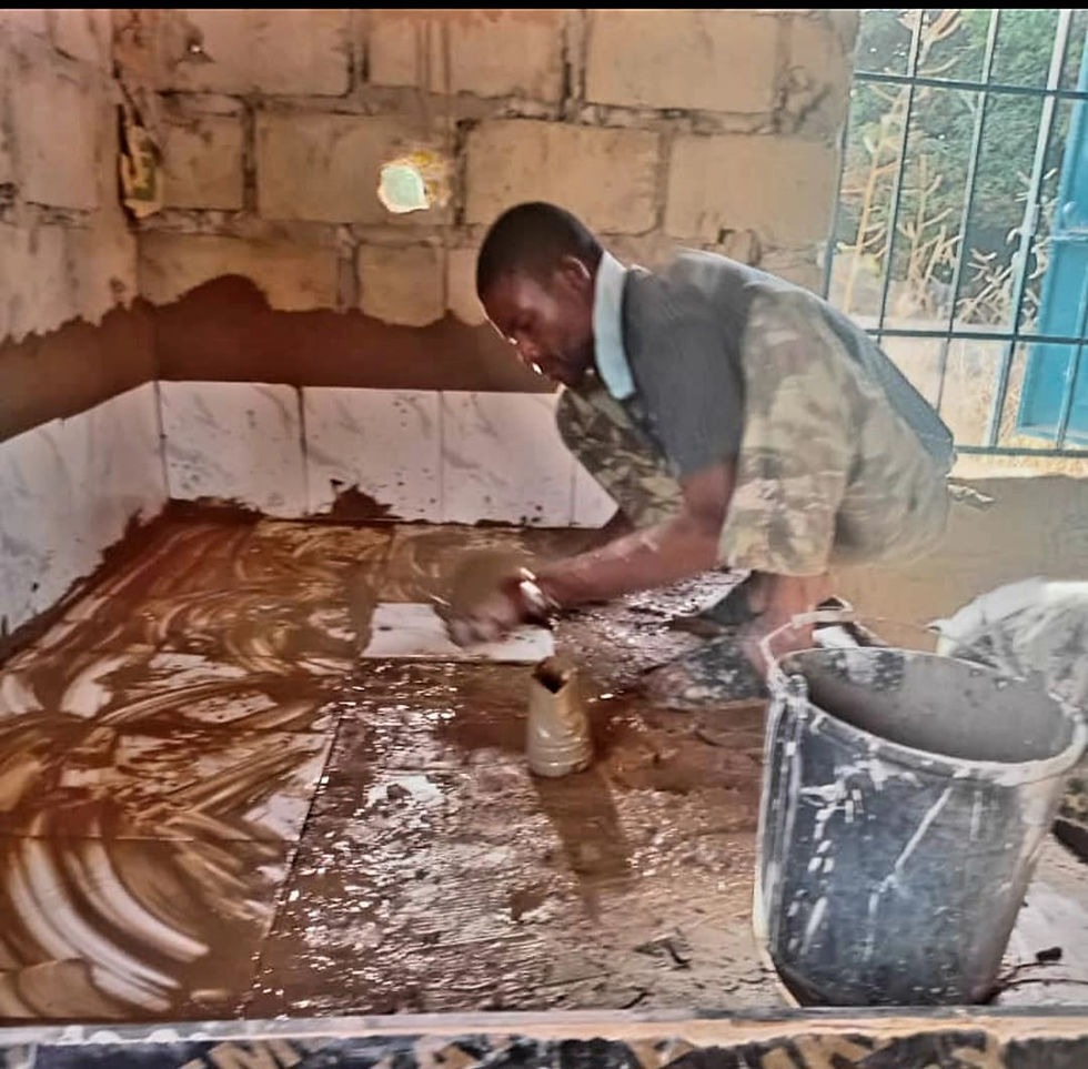 Grouting the floor tiles