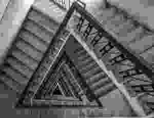 multi floor stairs grayscale photo