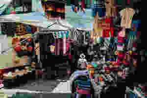 assorted color clothes display on street