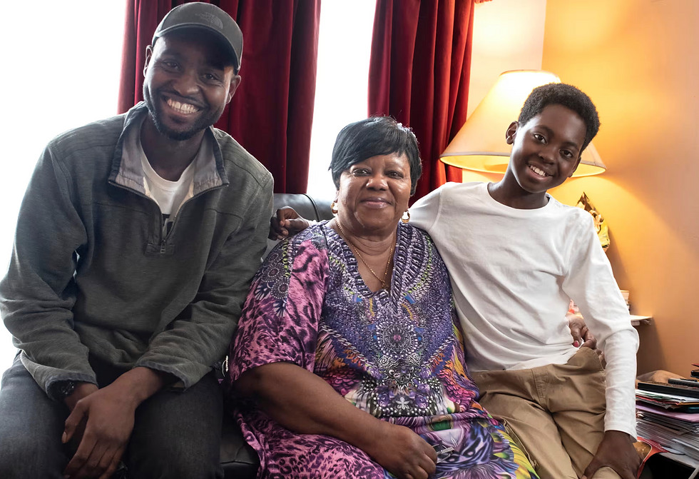 Mardoche Yembi, Fatima Jalloh (his foster mother) and Jeriah Kibusi. Photo: Sarah Ainslie