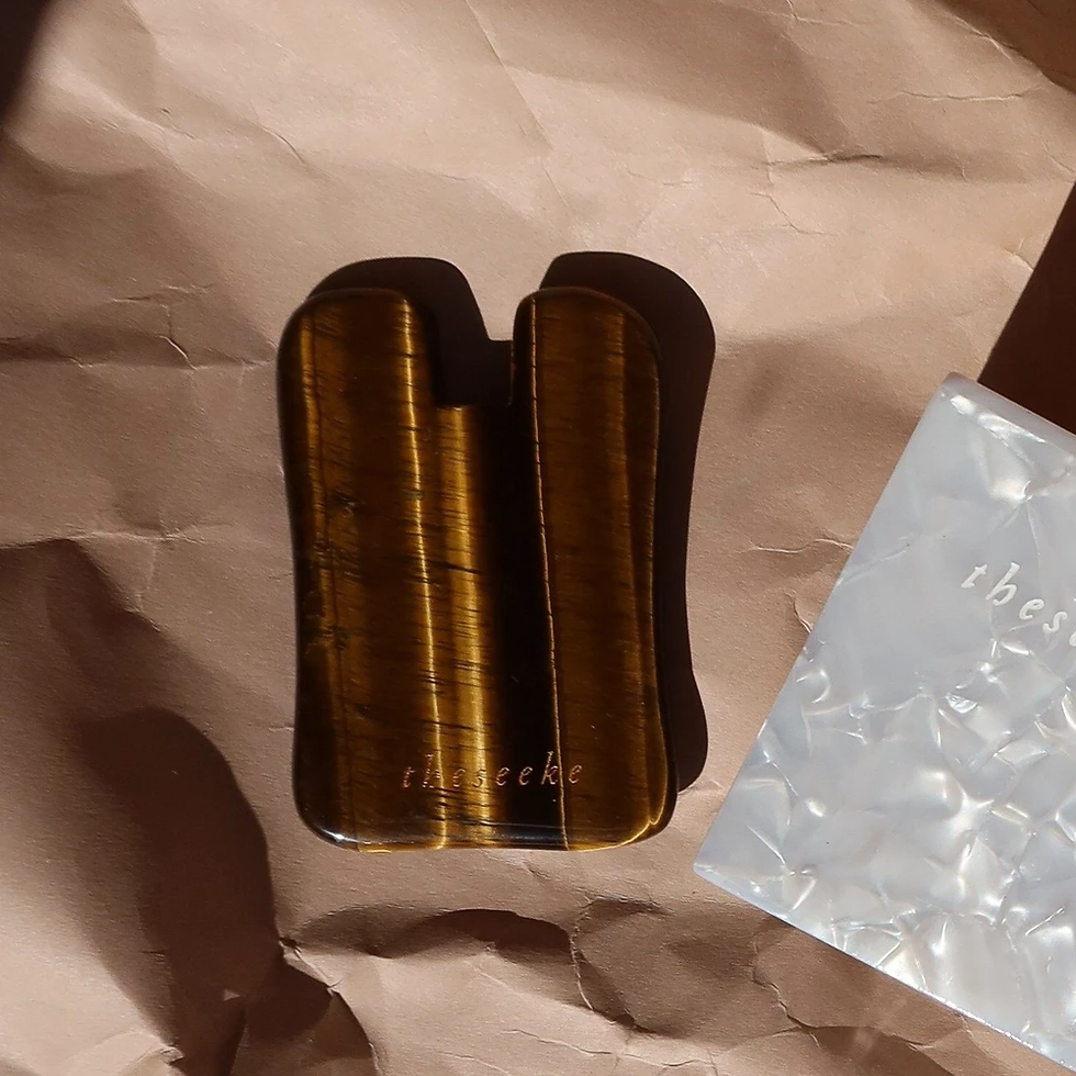 Thumbnail: The Seeke, Tigers Eye Gem U Shape Gua Sha