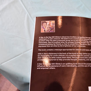 Books written by Author Jeremy C. Watson on table during Grandparents 2023 by Culture and Climate Changers