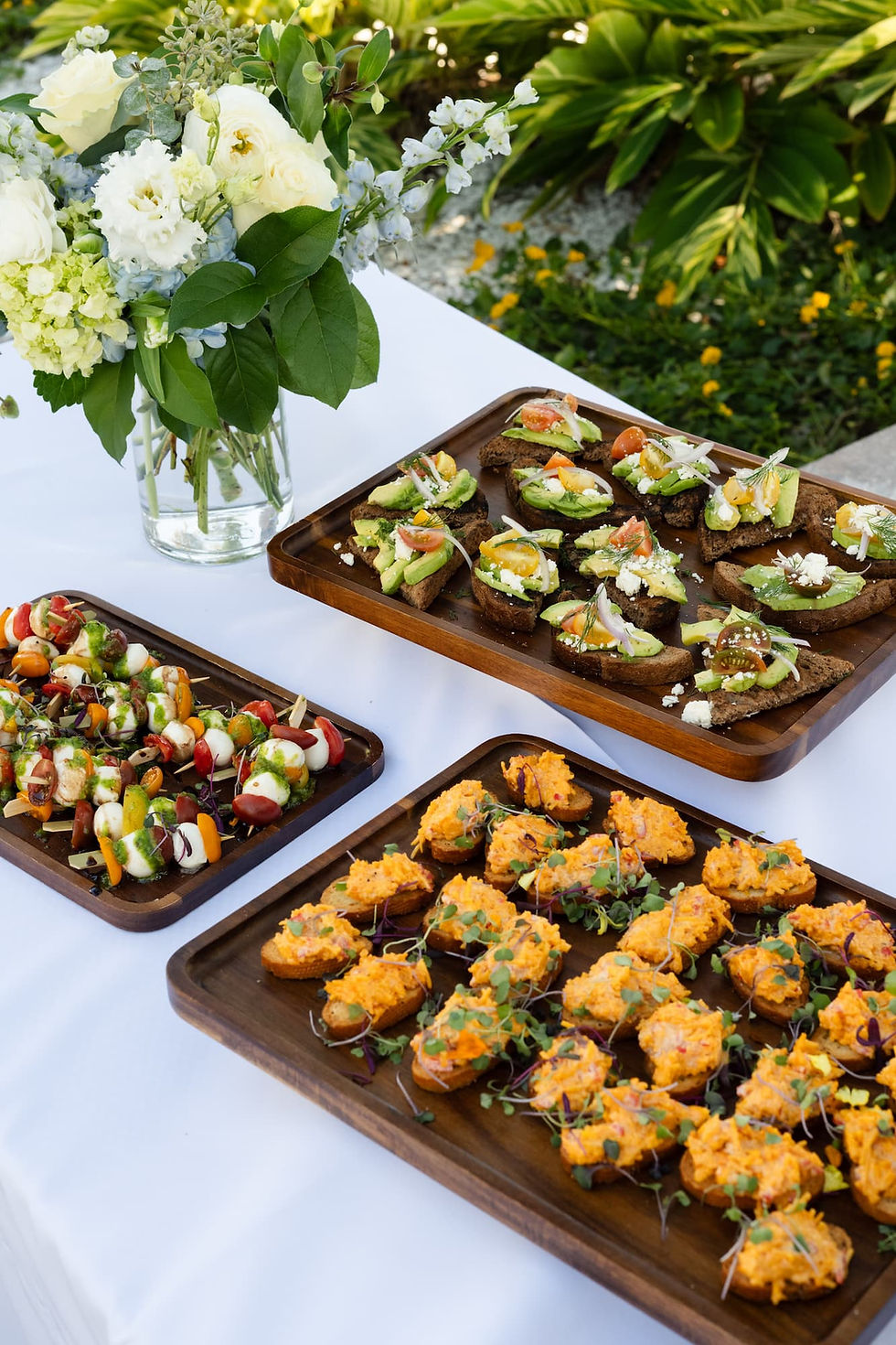 Family-style sharing platters with wood-fired proteins and Aegean meze, Alder & Oak catering