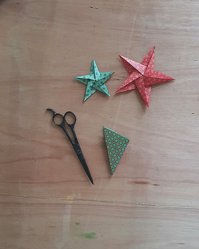 Unfold the paper to reveal your pentagon.