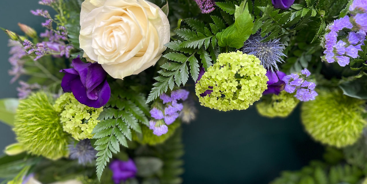 a close up of a fresh flower wreath