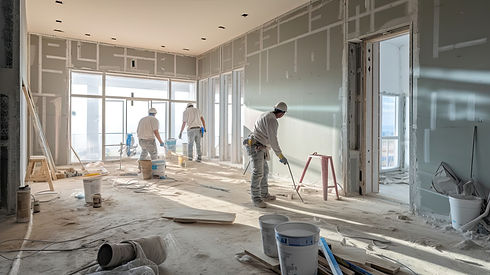 A group of construction workers in hard hats and vests