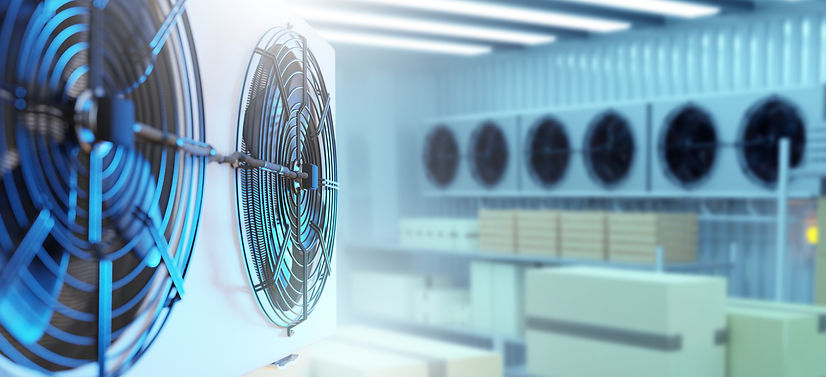 Close-up of industrial cooling fans in a spacious