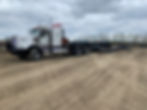 Heavy haul tractor with multi-axle trailer ready for transport