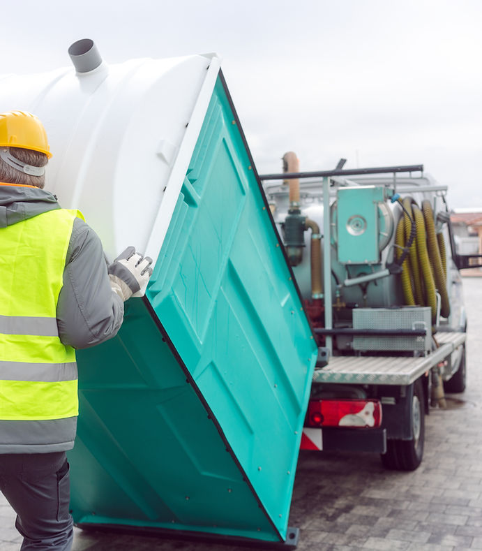 Rental lavatory being loaded on truck