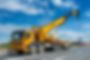 Crane on a road in construction site