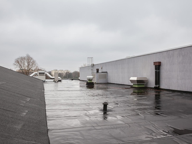 How to Reduce Heat on a Flat Roof in the Summer Sun