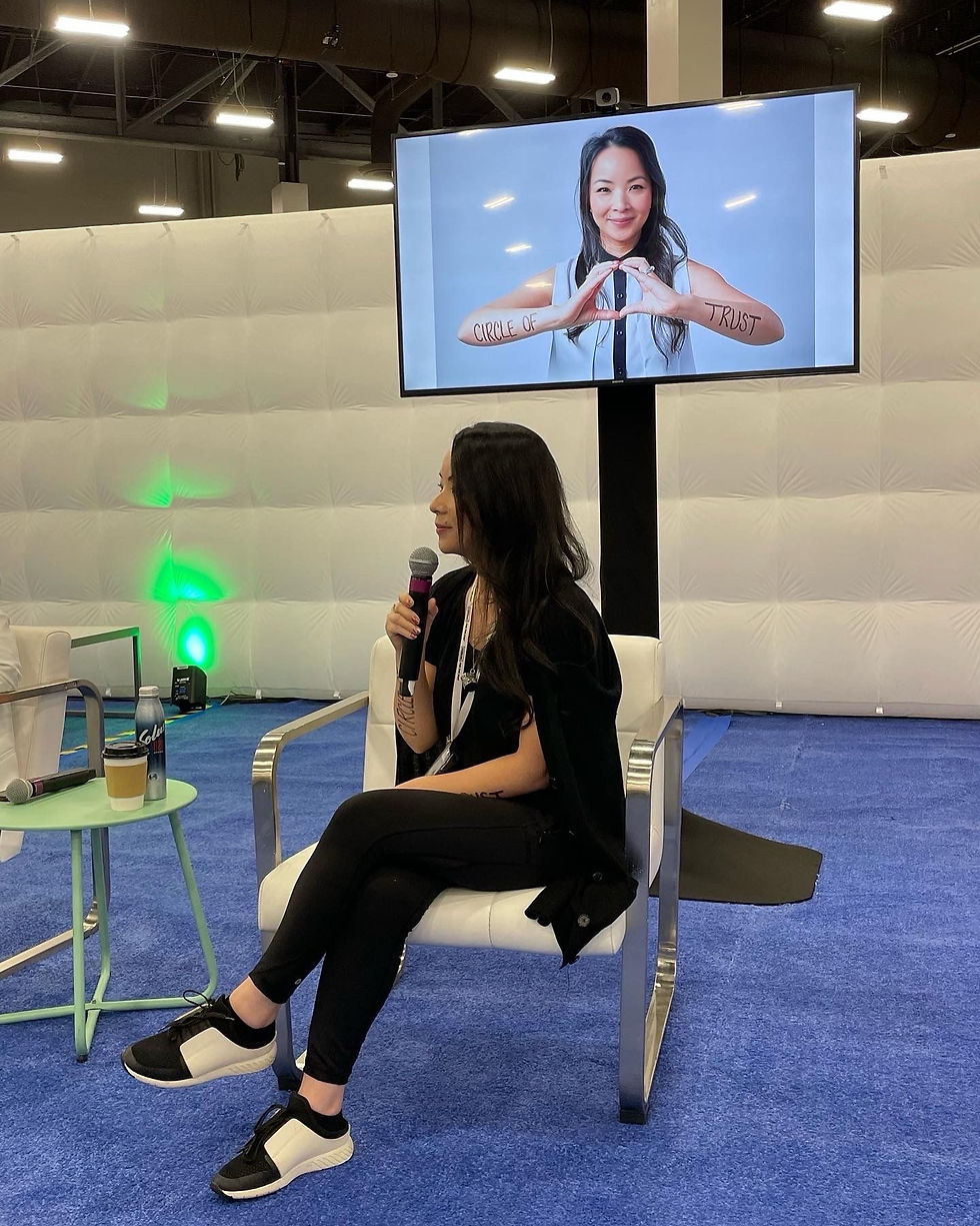 Connie Cay-Santos speaking at IMEX during the Dear World activation, sharing the story behind the Circle of Trust