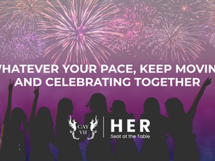Fireworks over a group of women celebrating together, featuring the HER Seat at the Table July newsletter title: "Whatever Your Pace, Keep Moving and Celebrating Together."