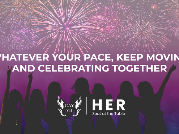 Fireworks over a group of women celebrating together, featuring the HER Seat at the Table July newsletter title: "Whatever Your Pace, Keep Moving and Celebrating Together."