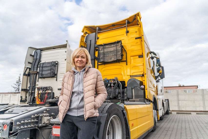 caucasian-mid-age-woman-driving-truck-trucker-fem-2025-01-09-07-52-33-utc.jpg