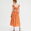 Miniatura: Vestido midi con espalda abierta en tejido arrugado naranja