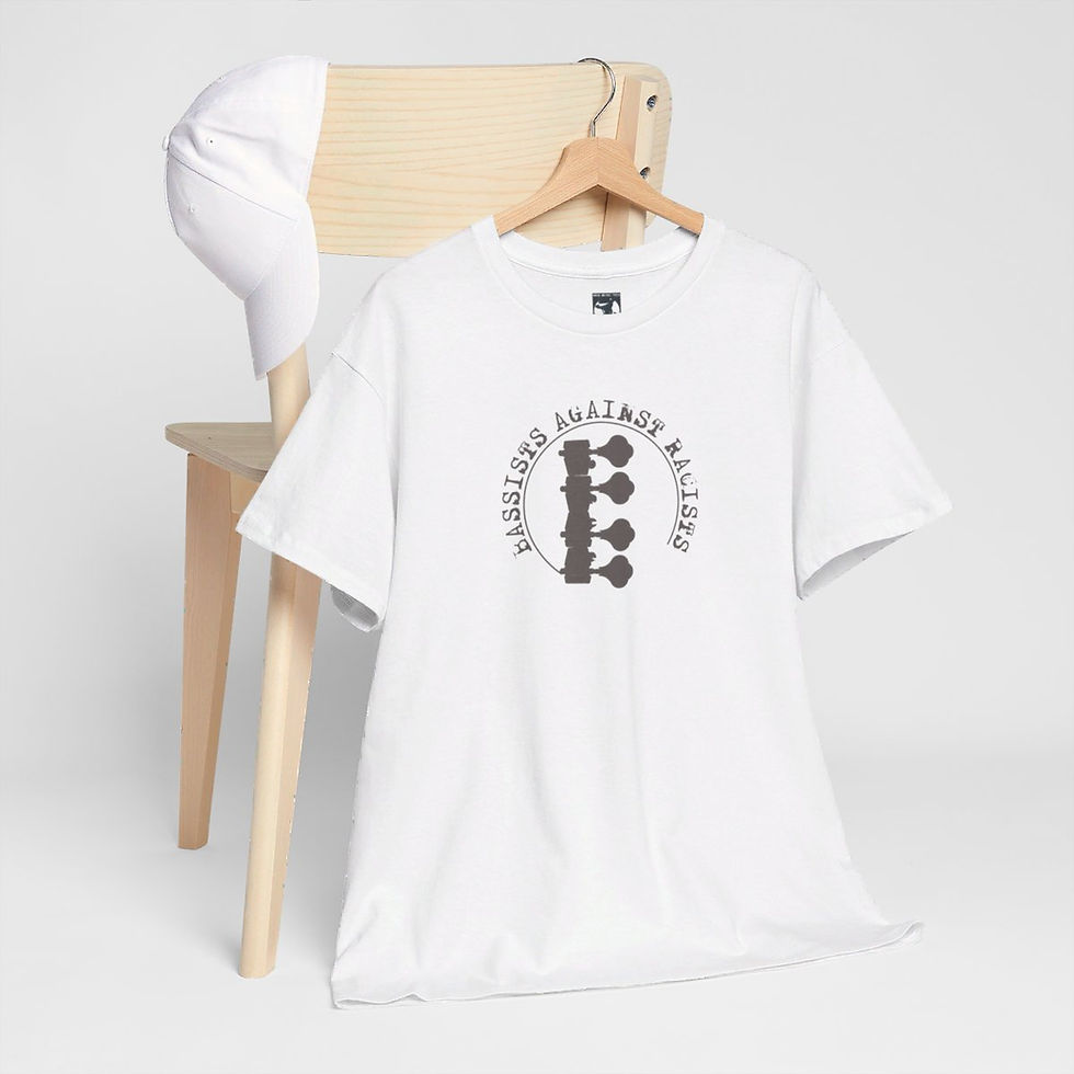 Thumbnail: White t-shirt hanging on a wooden chair; visible text reads 