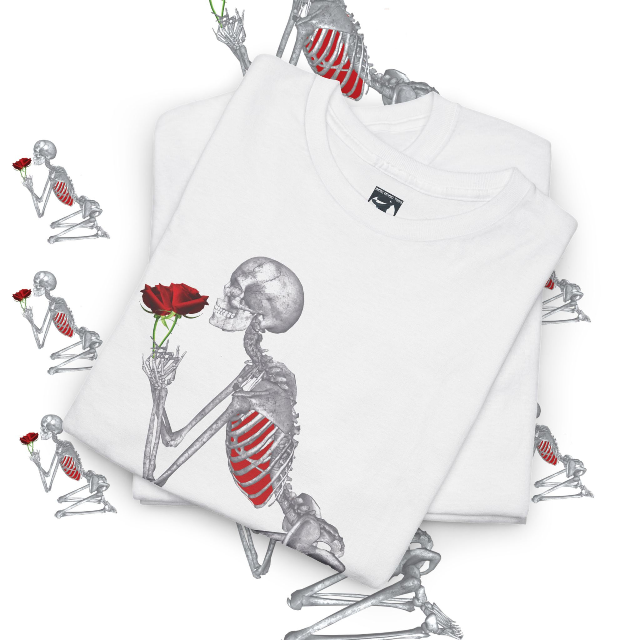 White t-shirts with skeleton and rose design. Artwork on t-shirts. indiemusictees
