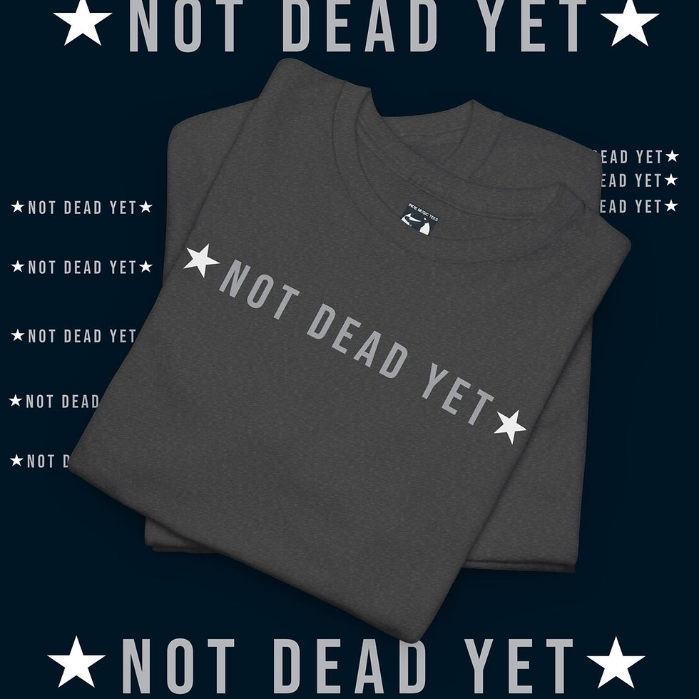 Thumbnail: Gray t-shirt says NOT DEAD YET, 1976 Unisex Premium Long Sleeved tshirt, and indiemusictees