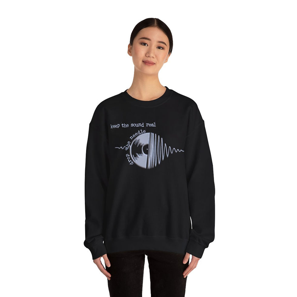 Thumbnail: Woman wearing black sweatshirt with graphic and text, indiemusictees logo.