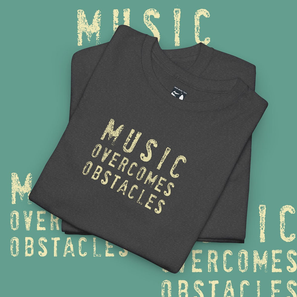 Gray t-shirt with "MUSIC OVERCOMES OBSTACLES" printed on it, indiemusictees