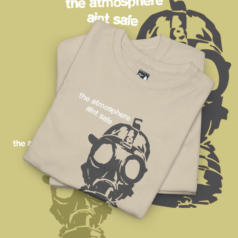 Beige t-shirt with gas mask graphic, text reading 'The atmosphere ain't safe'. indiemusictees