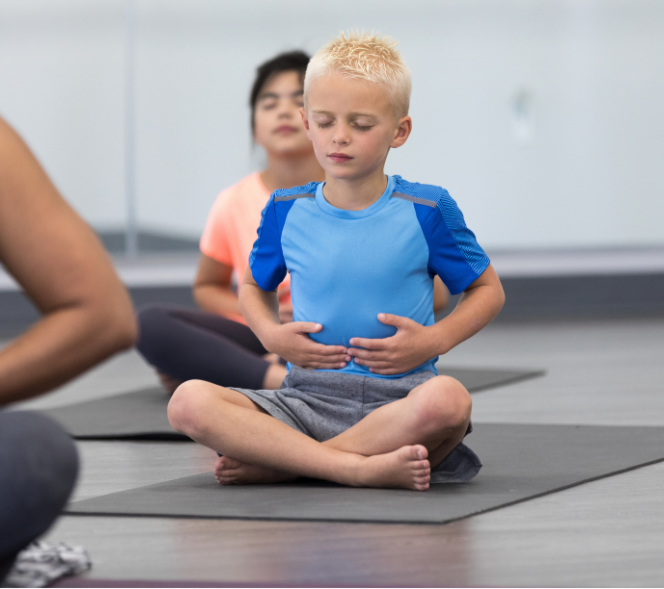 Young boy doing yoga