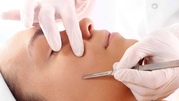 professional dermaplaning by a certified licensed esthetician