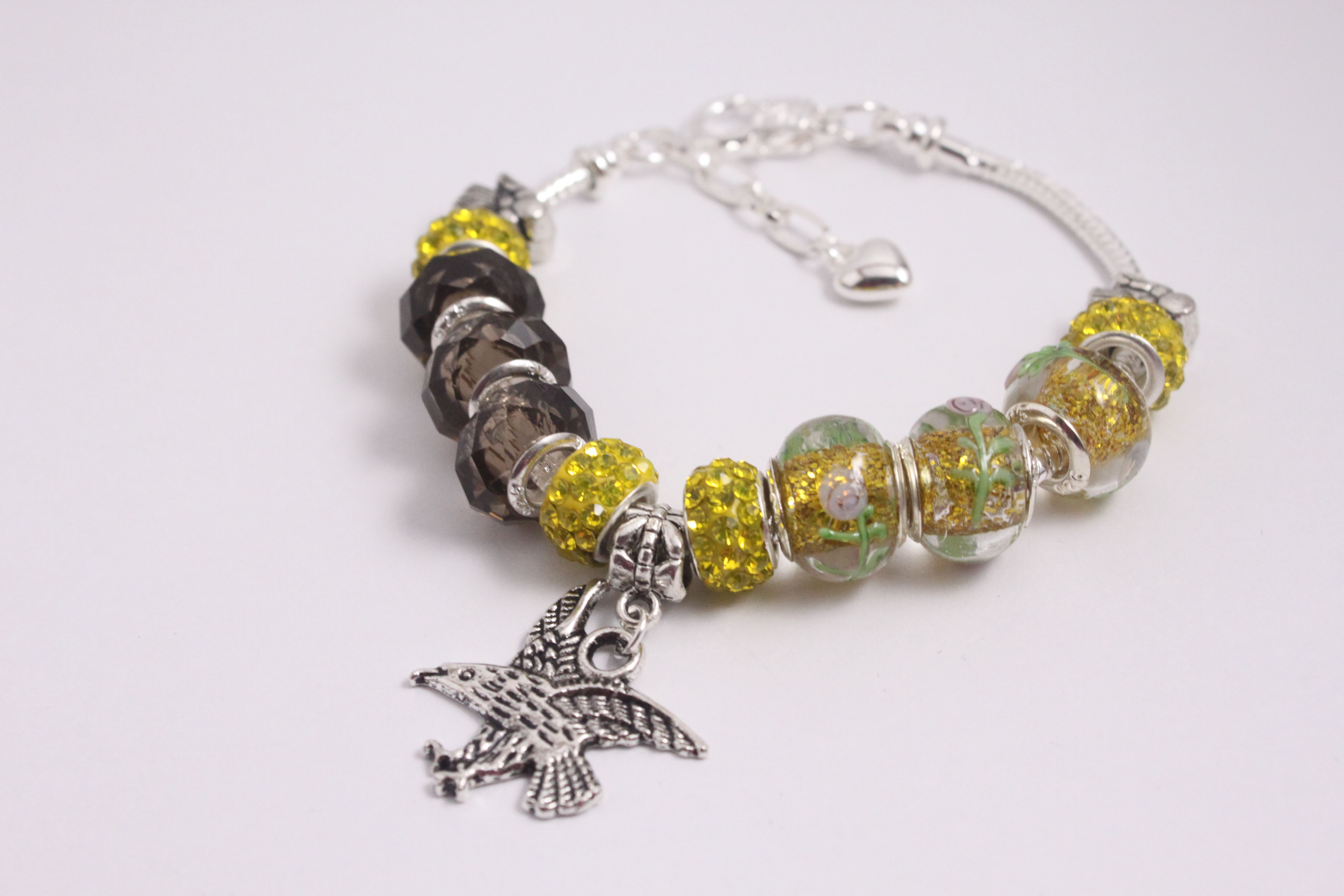 Bird charm bracelet - yellow
