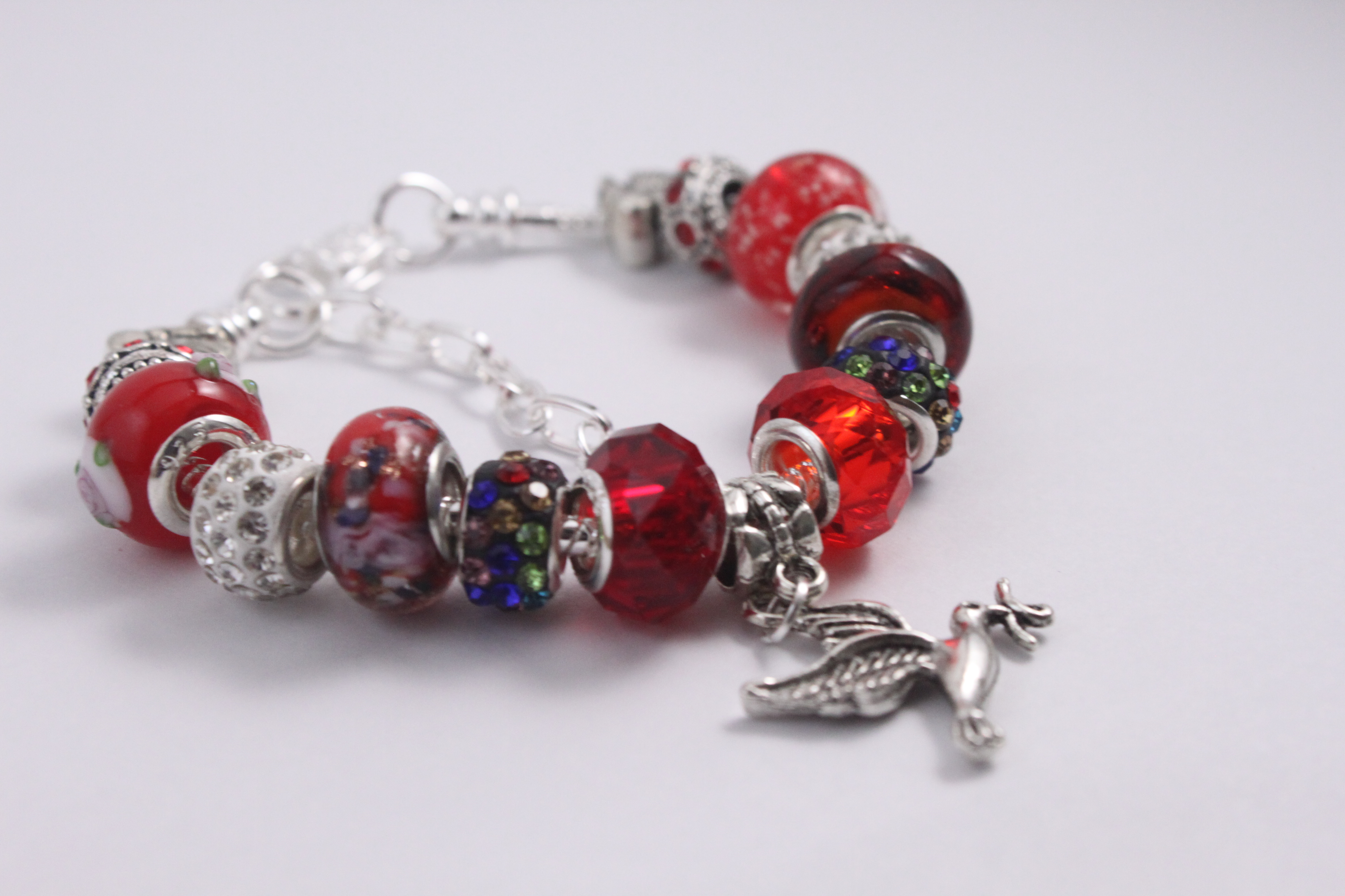 Bird charm bracelet - deep red