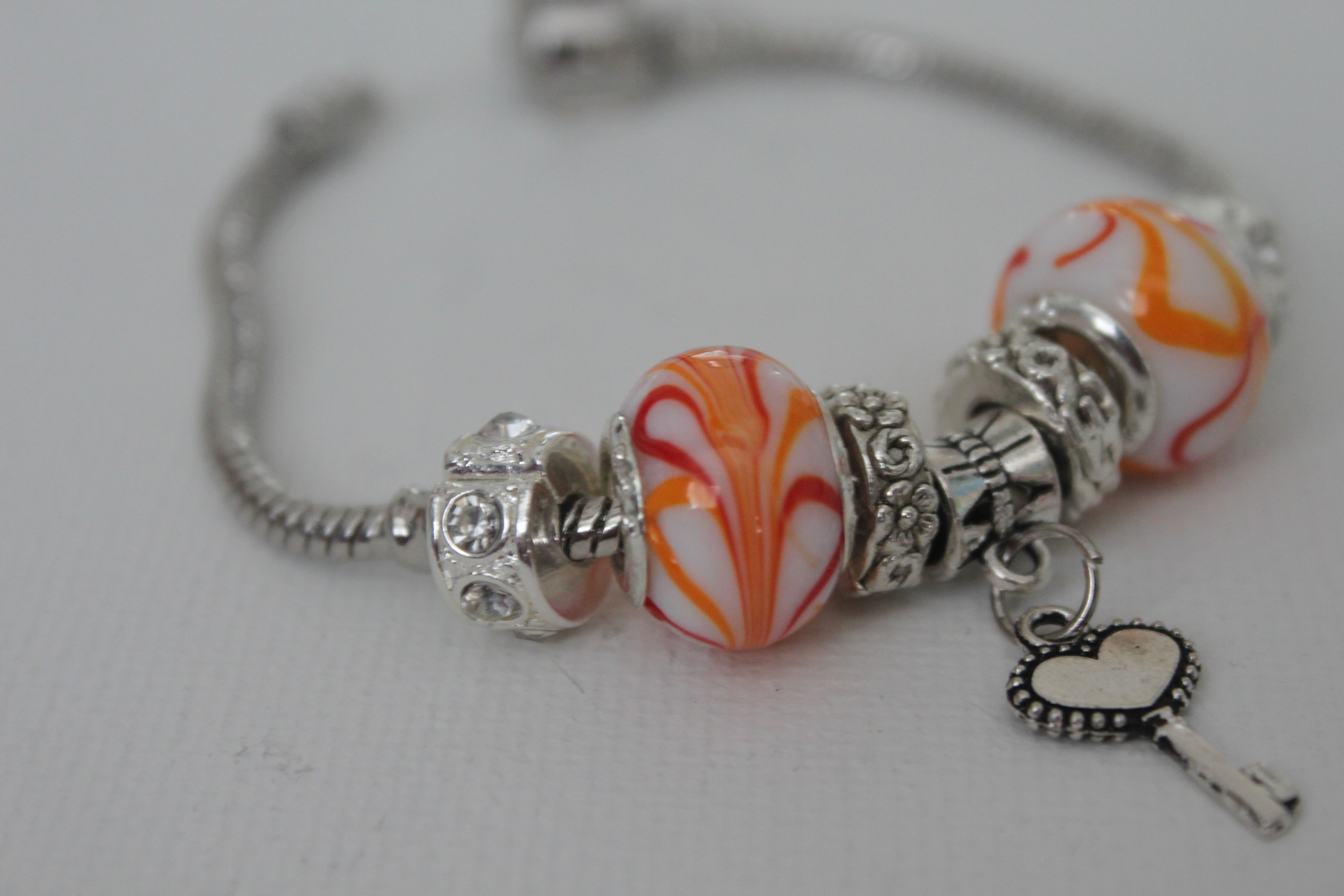 Key charm bracelet orange