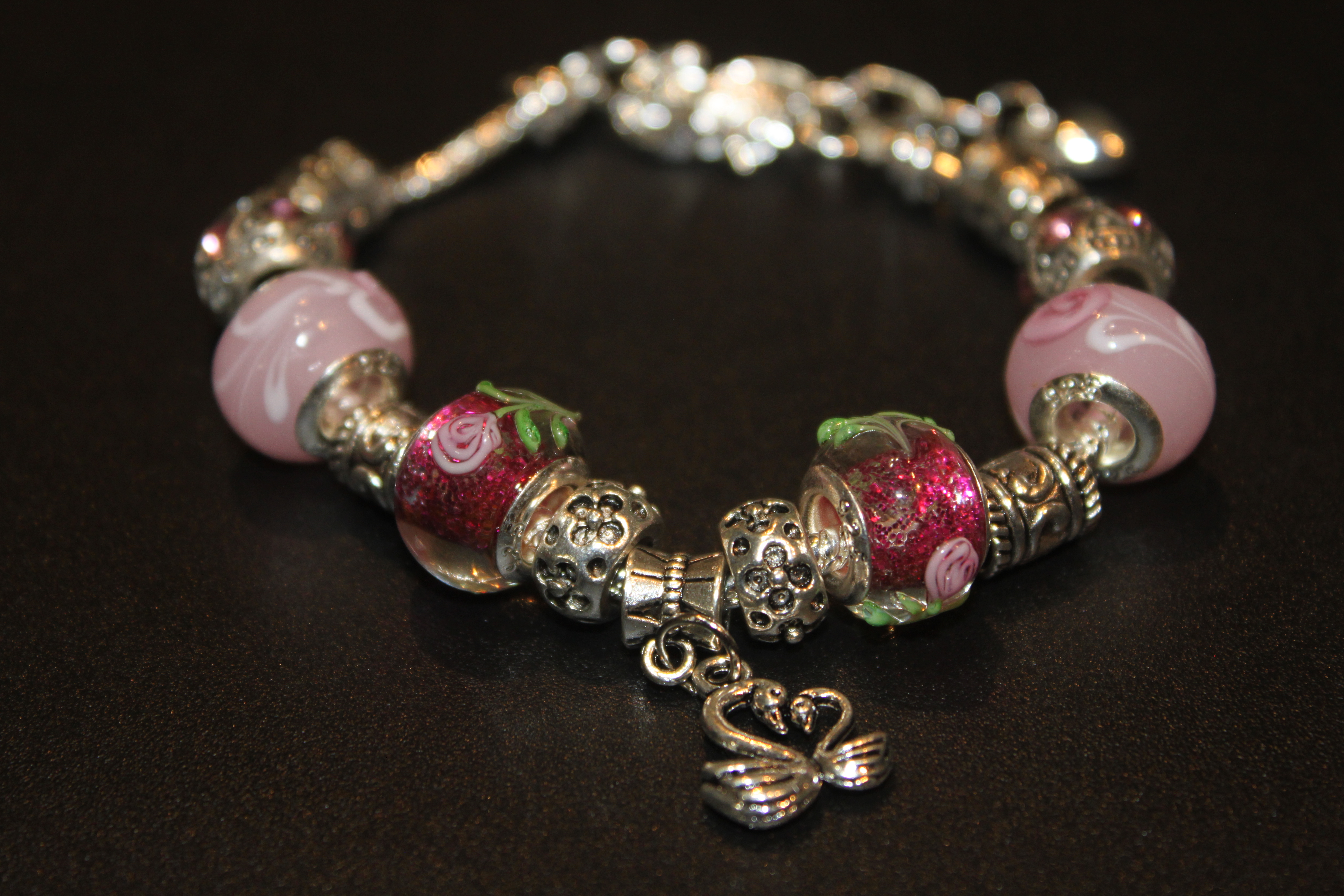 Swans charm bracelet - Rose