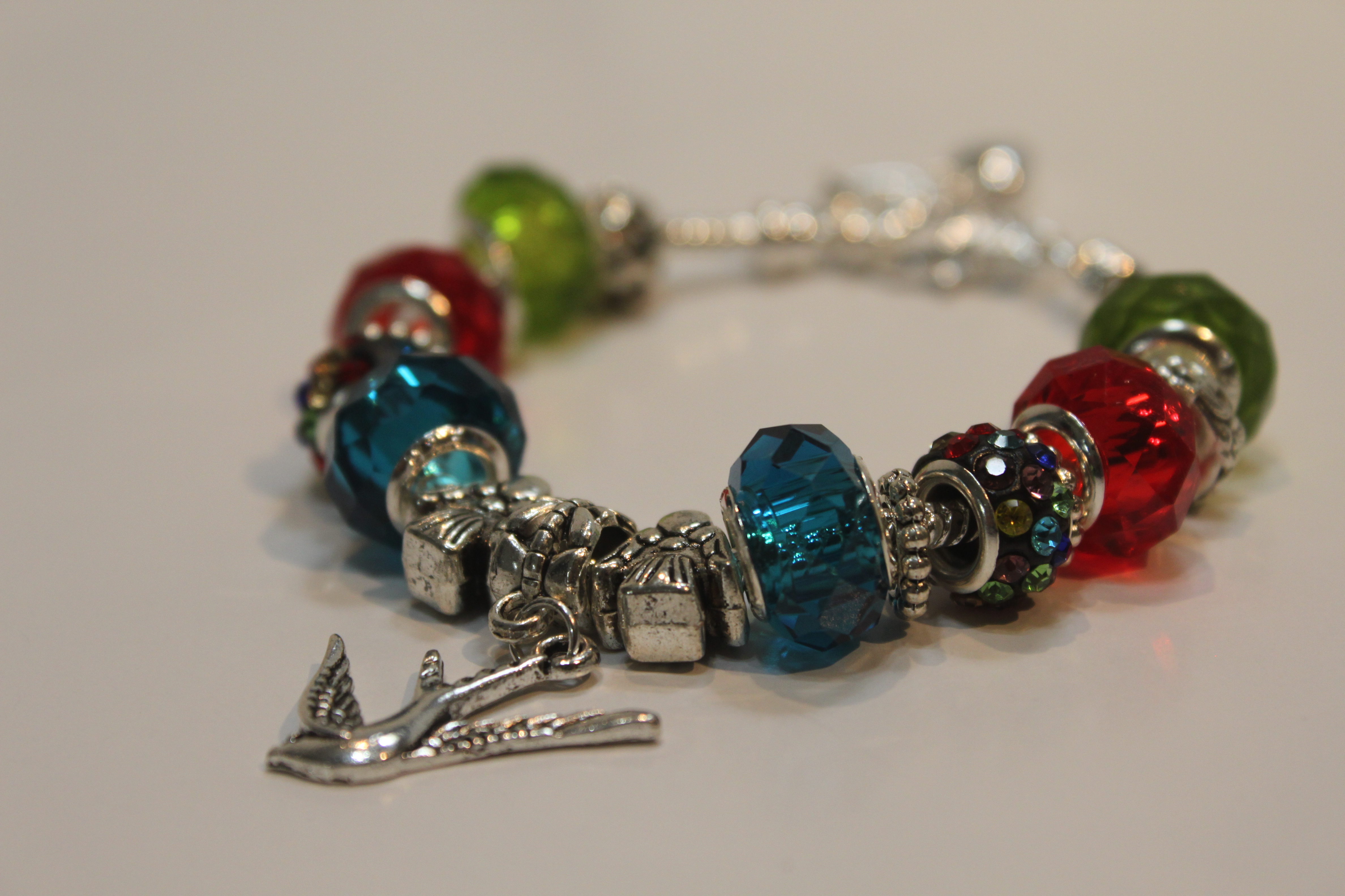 Bird charm bracelet - red blue green