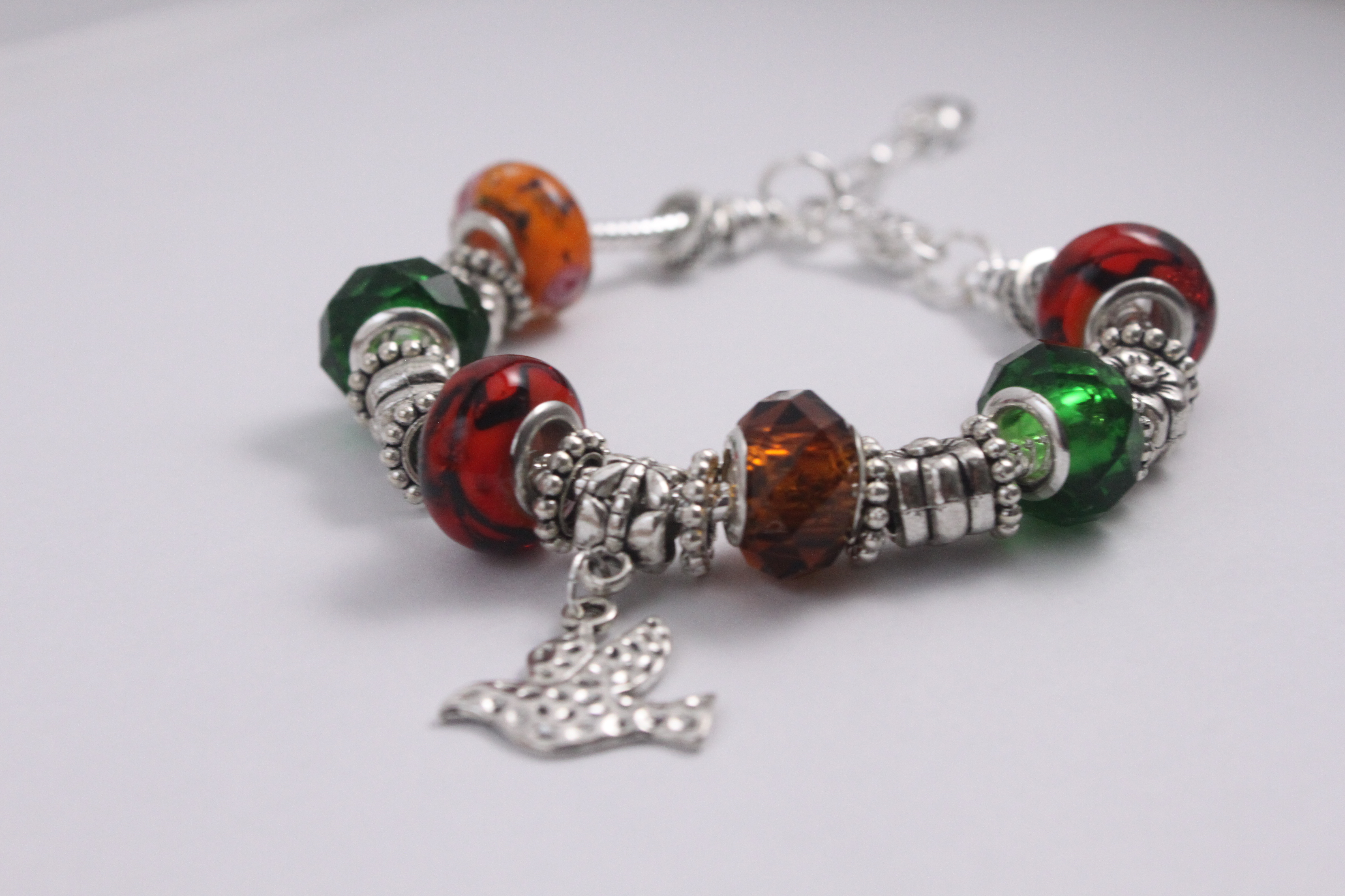 Bird charm bracelet - red green