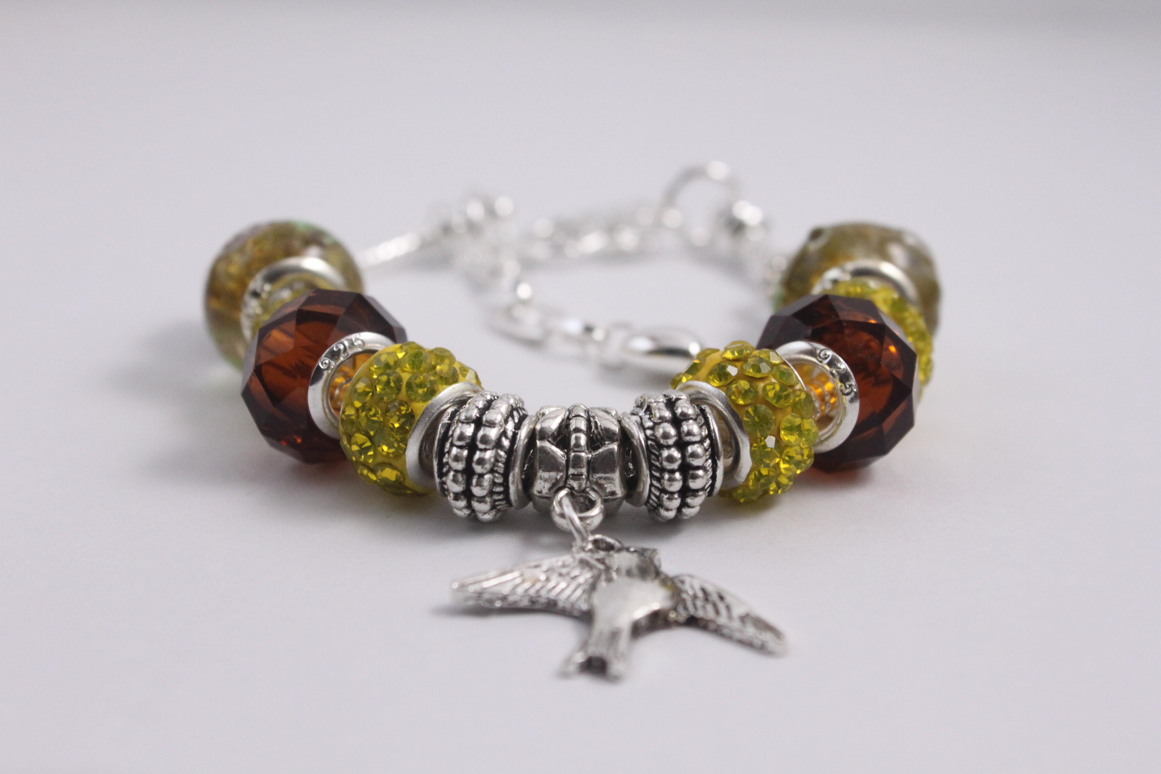 Bird charm rracelet - yellow