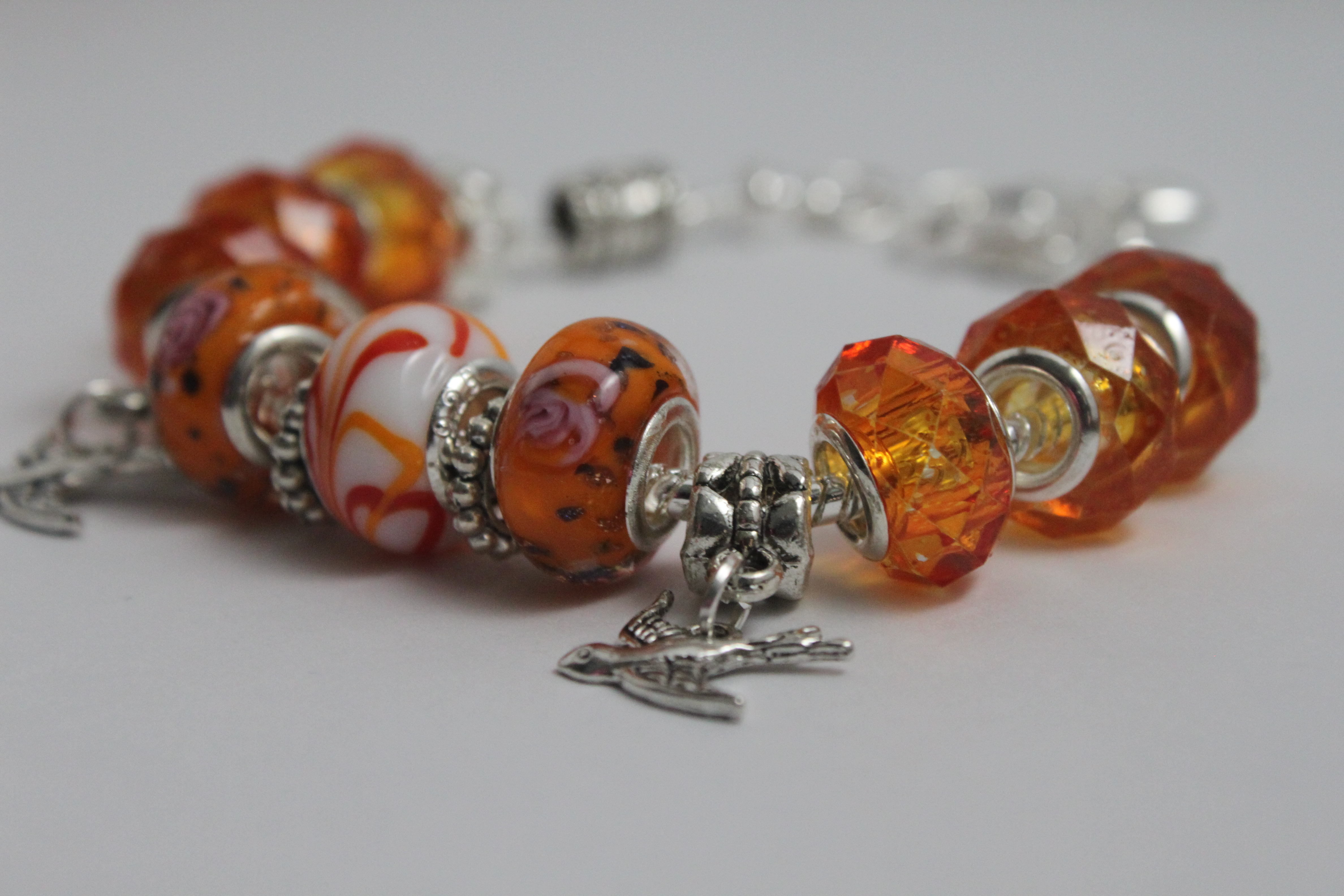 Double bird charm bracelet - orange