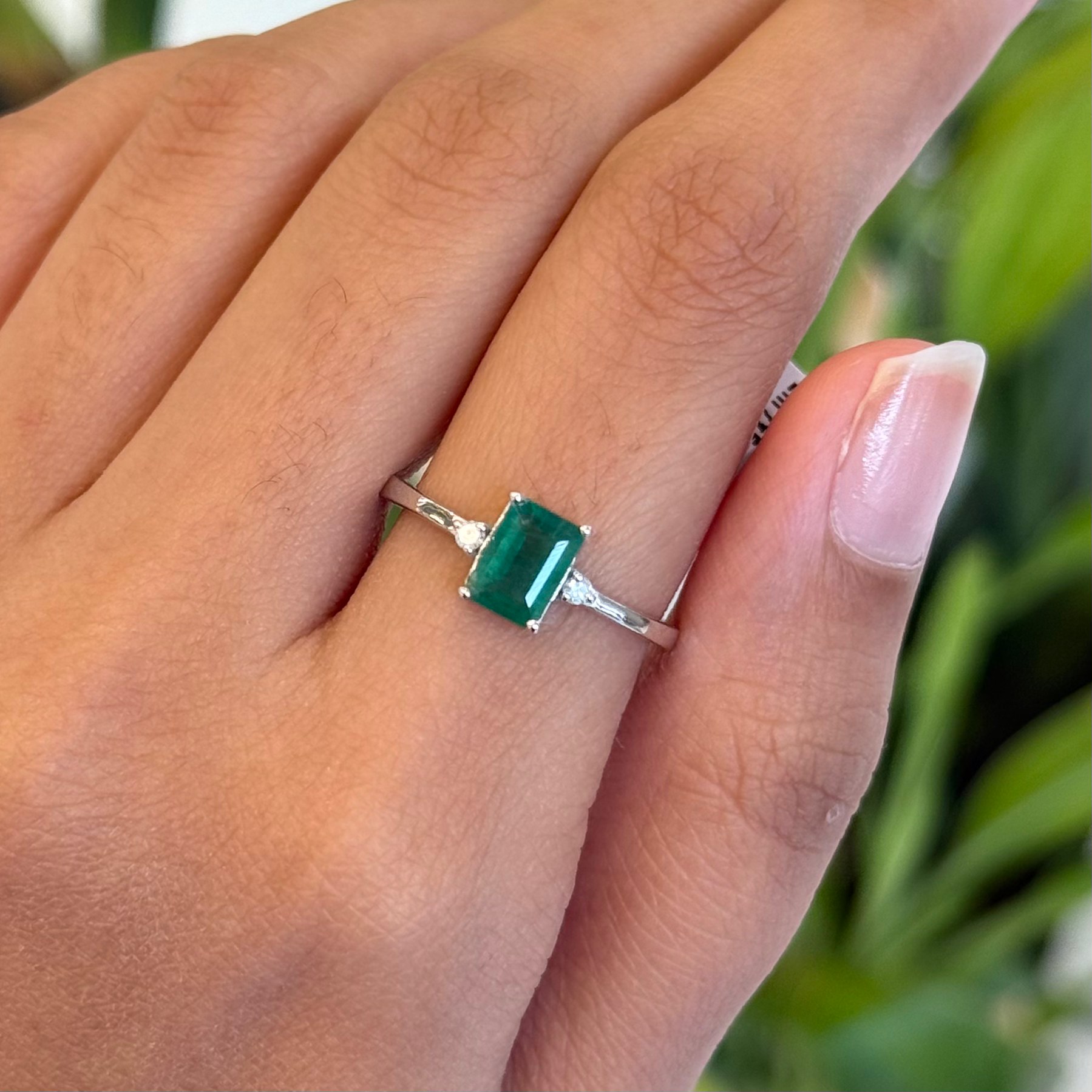 Natural emerald and diamond cluster ring