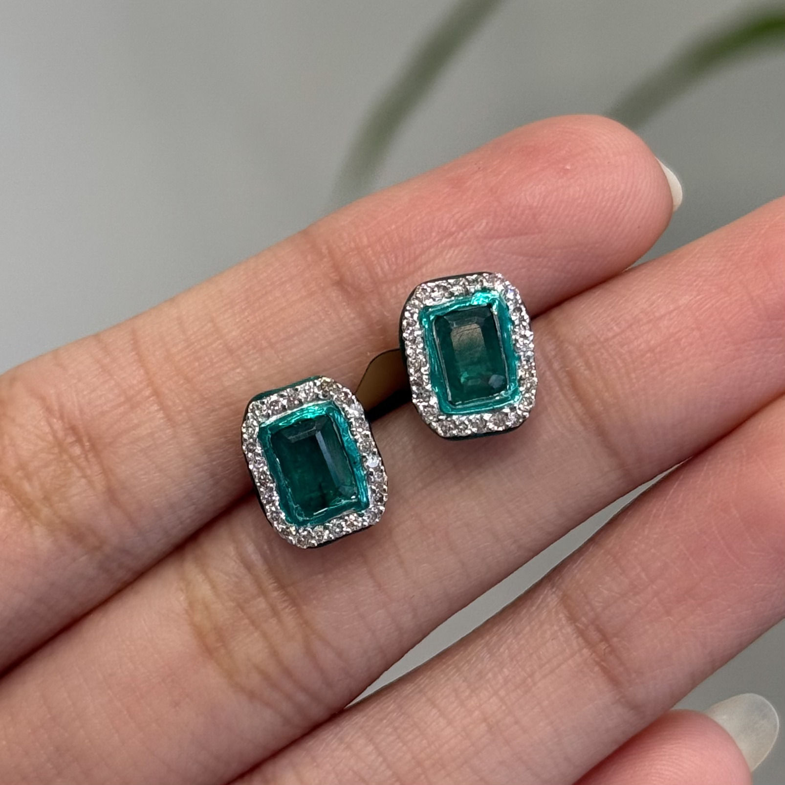 Natural Emerald and diamond earrings in 14 karat gold