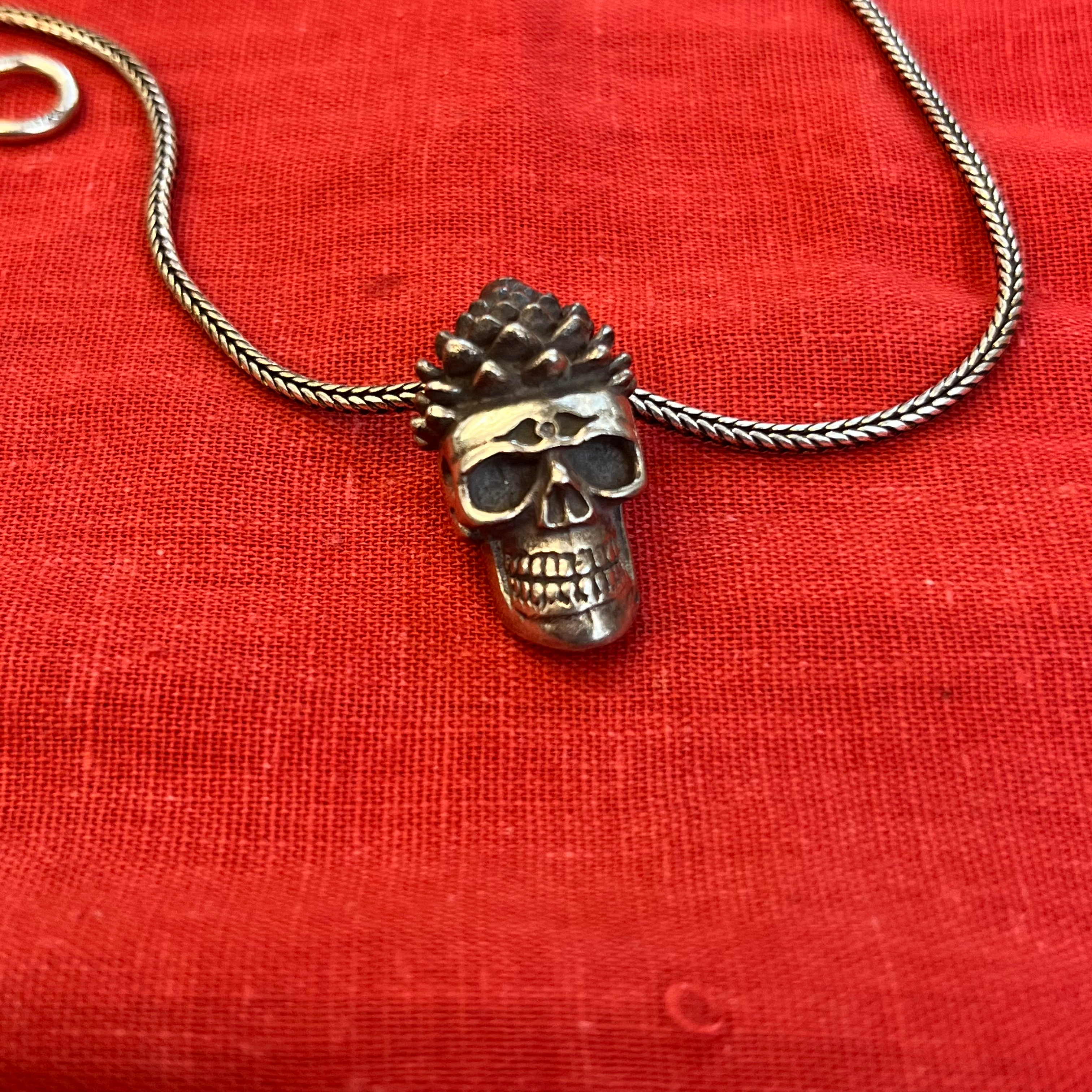Silver skull pendant