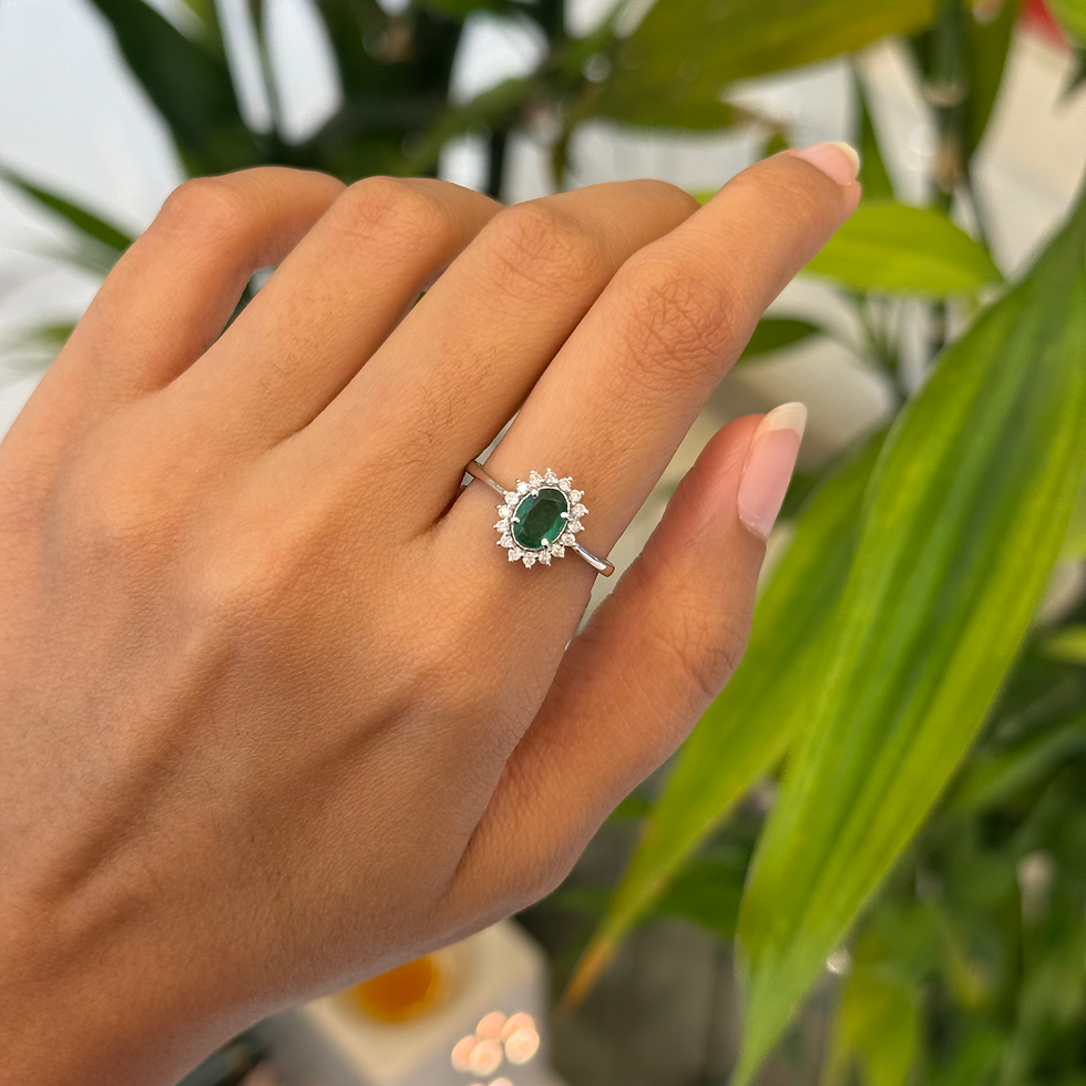 Natural emerald and diamond cluster ring