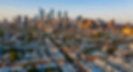 Aerial view over the neighborhoods and streets of Philadelphia PA USA.jpg