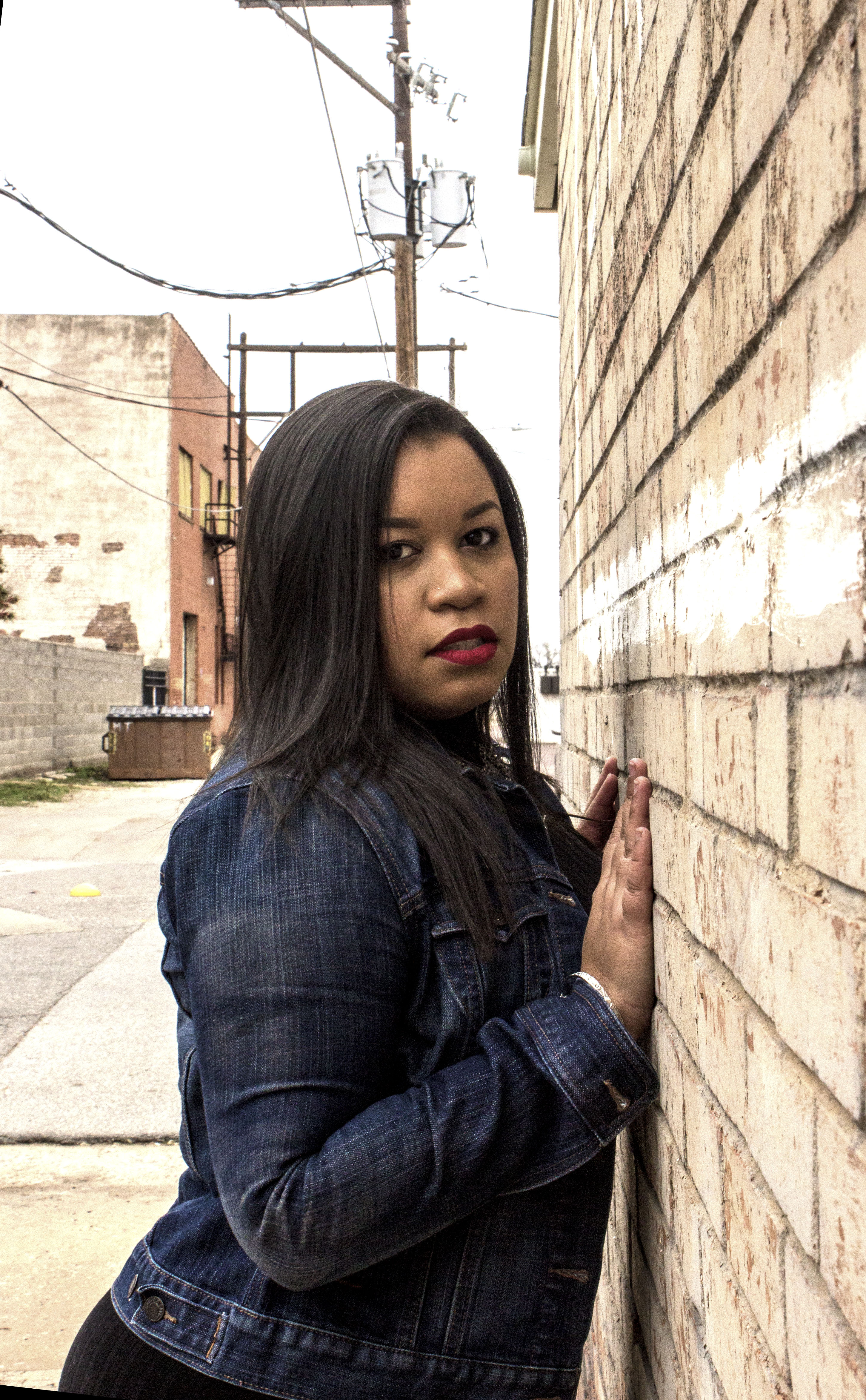 Against the wall