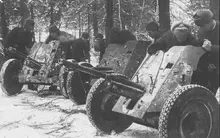 Soviets_inspect_captured_PaK_36s,_Russia_1942.webp