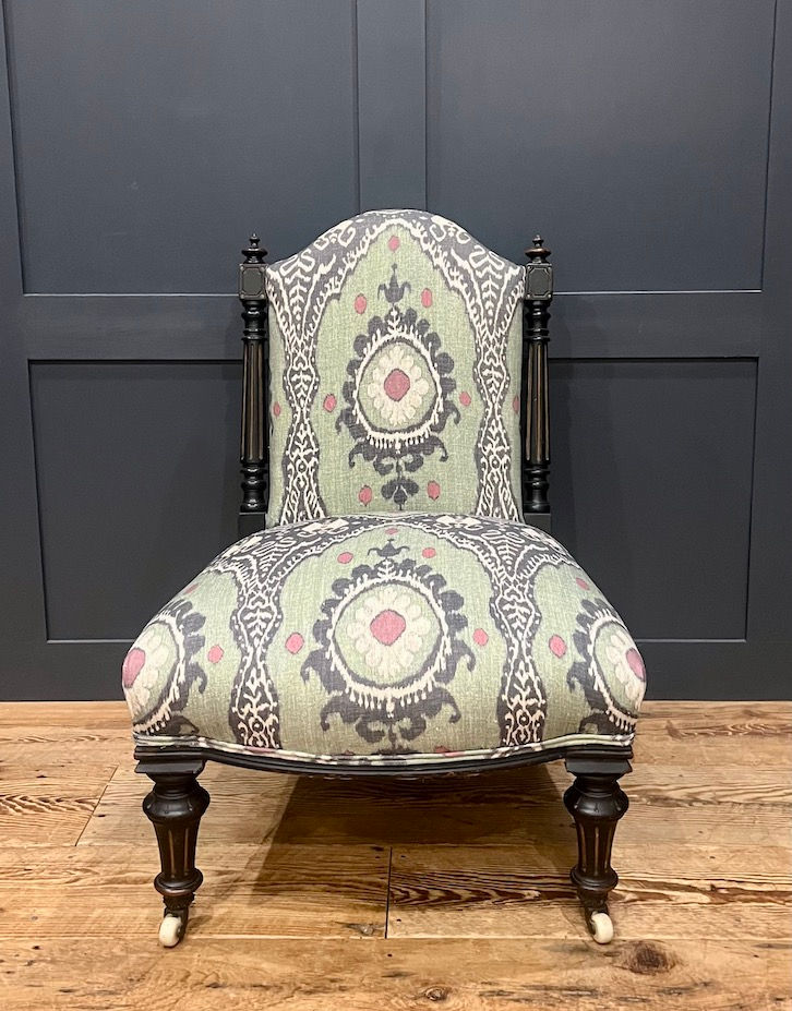 Thumbnail: A Victorian English Ebonised Slipper Chair