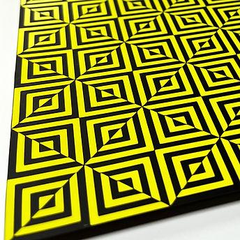 "Diagonalis Secretus", yellow and black geometric abstract art photographed in close-up, with repeating diamond effect